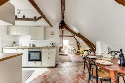 Cuisine ou kitchenette dans l'établissement Appartement de charme sous les toits