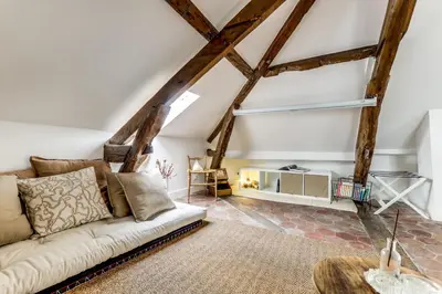 Coin salon dans l'établissement Appartement de charme sous les toits