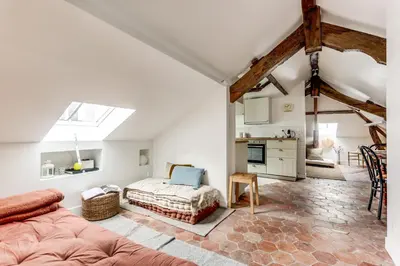 Coin salon dans l'établissement Appartement de charme sous les toits