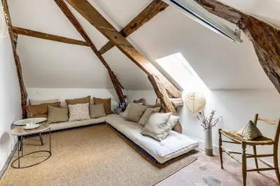 Coin salon dans l'établissement Appartement de charme sous les toits