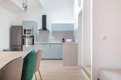 Cuisine ou kitchenette dans l'établissement Superbe appartement 8 personnes #5