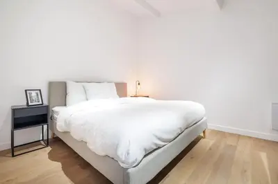 Un ou plusieurs lits dans un hébergement de l'établissement Superbe appartement 8 personnes #5