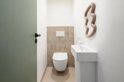 Salle de bains dans l'établissement Noble Suites