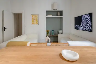 Un ou plusieurs lits dans un hébergement de l'établissement Noble Suites