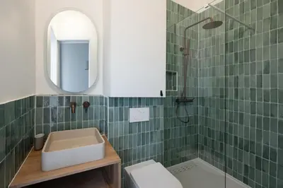 Salle de bains dans l'établissement Noble Suites