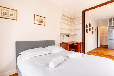Un ou plusieurs lits dans un hébergement de l'établissement GuestReady - Charmant Appartement Lumineux