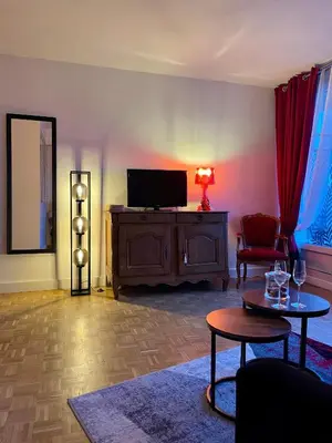 Télévision ou salle de divertissement dans l'établissement Vue imprenable sur la Tour Eiffeil
