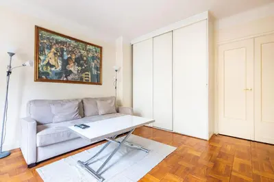 Coin salon dans l'établissement Studio#Porte Dauphine#Avenue Foch#2pers.