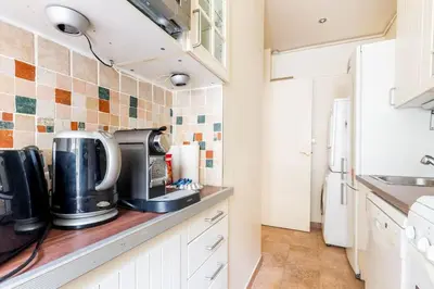 Cuisine ou kitchenette dans l'établissement Studio#Porte Dauphine#Avenue Foch#2pers.