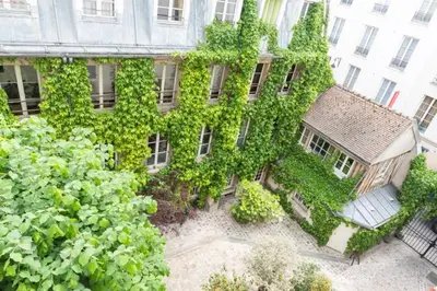 Jardin de l'établissement GuestReady - Superb haven of peace in Marais