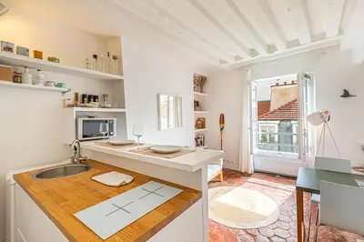 Cuisine ou kitchenette dans l'établissement GuestReady - Superb haven of peace in Marais