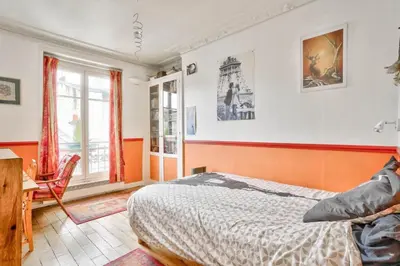 Un ou plusieurs lits dans un hébergement de l'établissement Beautiful cocoon near Montmartre