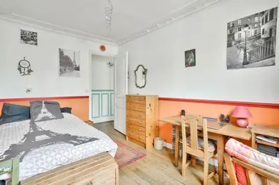 Un ou plusieurs lits dans un hébergement de l'établissement Beautiful cocoon near Montmartre