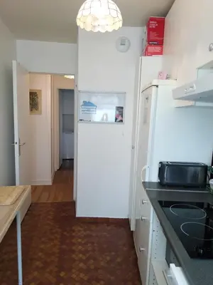 Cuisine ou kitchenette dans l'établissement Sympa-Appart