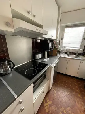 Cuisine ou kitchenette dans l'établissement Sympa-Appart