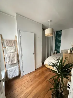 Un ou plusieurs lits dans un hébergement de l'établissement Appartement proche Montmartre