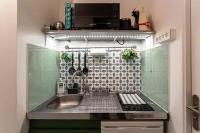 Cuisine ou kitchenette dans l'établissement Studio calme et accueillant Metro Charonne