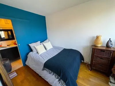 Un ou plusieurs lits dans un hébergement de l'établissement Appartement lumineux Père Lachaise