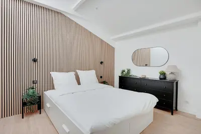 Un ou plusieurs lits dans un hébergement de l'établissement Paris Expo - Charming Loft at the Gates of Paris - GetHosted