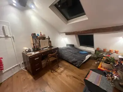 Télévision ou salle de divertissement dans l'établissement Sous les toits de Paris shared place
