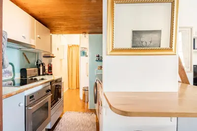 Cuisine ou kitchenette dans l'établissement Appartement de charme - Haut Marais - Paris Centre