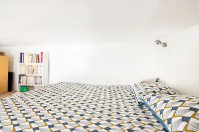 Un ou plusieurs lits dans un hébergement de l'établissement Appartement de charme - Haut Marais - Paris Centre