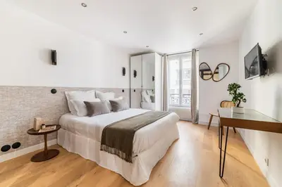Un ou plusieurs lits dans un hébergement de l'établissement Imhost 7 -Cosy apart Batignolles/Galerie Lafayette