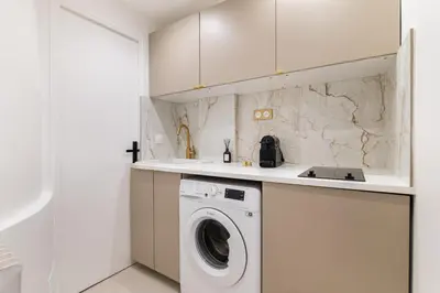 Cuisine ou kitchenette dans l'établissement Imhost 7 -Cosy apart Batignolles/Galerie Lafayette