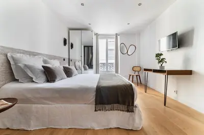 Un ou plusieurs lits dans un hébergement de l'établissement Imhost 7 -Cosy apart Batignolles/Galerie Lafayette