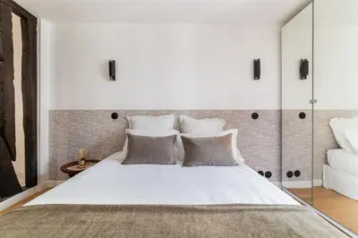 Un ou plusieurs lits dans un hébergement de l'établissement Imhost 7 -Cosy apart Batignolles/Galerie Lafayette