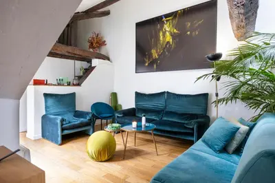 Coin salon dans l'établissement L'appartement du Cirque