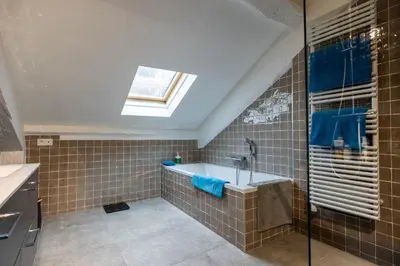 Salle de bains dans l'établissement L'appartement du Cirque