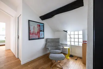Coin salon dans l'établissement L'appartement du Cirque