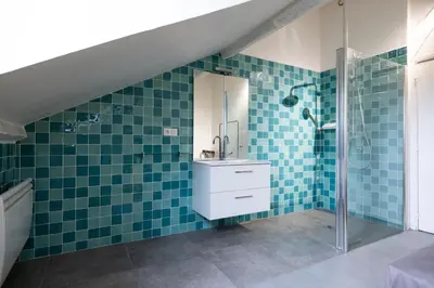 Salle de bains dans l'établissement L'appartement du Cirque