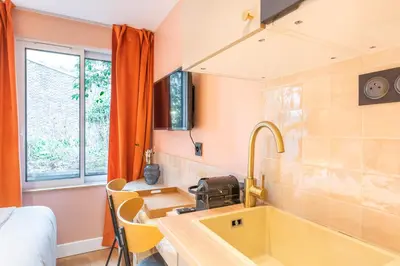 Télévision ou salle de divertissement dans l'établissement Maison Letellier