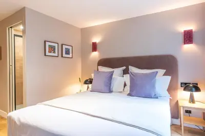 Un ou plusieurs lits dans un hébergement de l'établissement Maison Letellier