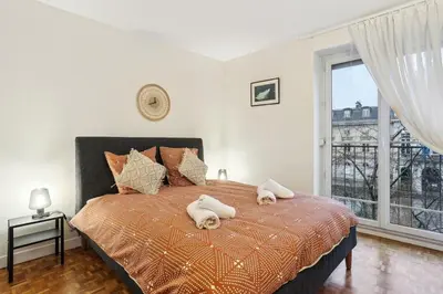 Un ou plusieurs lits dans un hébergement de l'établissement Charming apartment heart of 15th