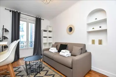 Coin salon dans l'établissement Cosy Studio Neuilly