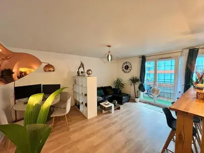 Coin salon dans l'établissement Spacieux, moderne et familiale - Paris à porte - Au pied du métro 14