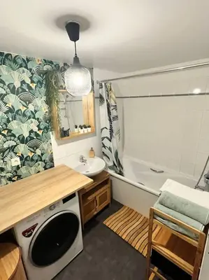 Coin salon dans l'établissement Spacieux, moderne et familiale - Paris à porte - Au pied du métro 14