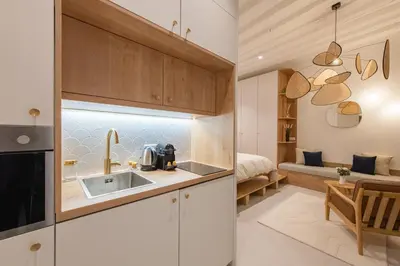 Cuisine ou kitchenette dans l'établissement Geranimus : Heart of Paris Montorgeuil