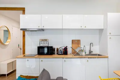 Cuisine ou kitchenette dans l'établissement GuestReady - 2BR Apt Paris Expo Porte Versailles