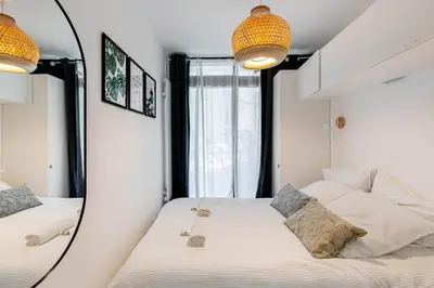 Un ou plusieurs lits dans un hébergement de l'établissement GuestReady - 2BR Apt Paris Expo Porte Versailles