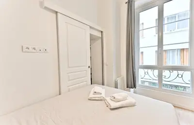 Un ou plusieurs lits dans un hébergement de l'établissement Appartement au cœur du Marais - IV
