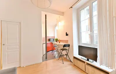 Télévision ou salle de divertissement dans l'établissement Appartement au cœur du Marais - IV