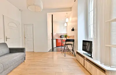Télévision ou salle de divertissement dans l'établissement Appartement au cœur du Marais - IV