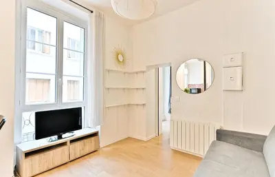 Télévision ou salle de divertissement dans l'établissement Appartement au cœur du Marais - IV
