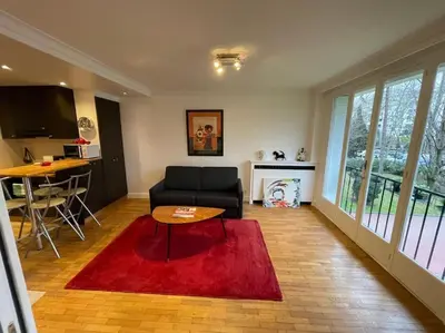 Coin salon dans l'établissement Calme et verdure à 2 pas de Paris