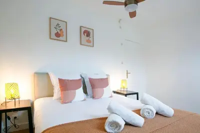Un ou plusieurs lits dans un hébergement de l'établissement Skyline Parisian Flat - Exclusif Saint-Honoré