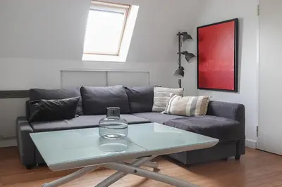 Coin salon dans l'établissement Skyline Parisian Flat - Exclusif Saint-Honoré